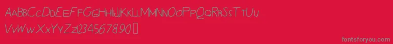 Quentrell-Schriftart – Graue Schriften auf rotem Hintergrund