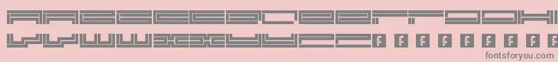 Trackmanic Font – Gray Fonts on Pink Background