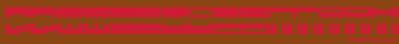 Trackmanic Font – Red Fonts on Brown Background