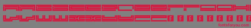 フォントTrackmanic – 赤い文字の灰色の背景