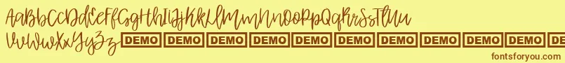 Шрифт AlbretDemo – коричневые шрифты на жёлтом фоне