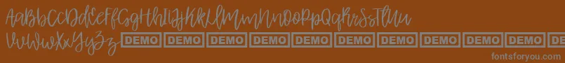 Шрифт AlbretDemo – серые шрифты на коричневом фоне