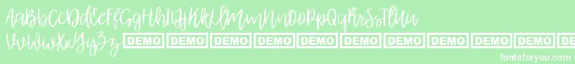 AlbretDemo-Schriftart – Weiße Schriften auf grünem Hintergrund