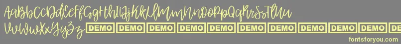 AlbretDemo Font – Yellow Fonts on Gray Background