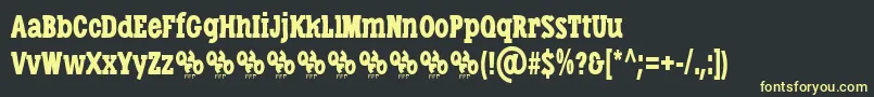 フォントLibertatusDuas – 黒い背景に黄色の文字