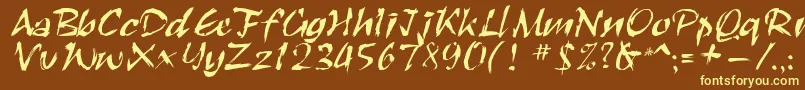 Roughbrush-fontti – keltaiset fontit ruskealla taustalla