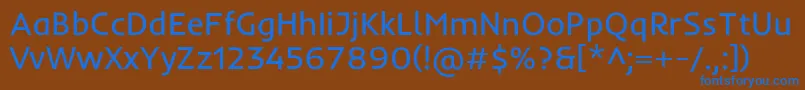 InderRegular-Schriftart – Blaue Schriften auf braunem Hintergrund