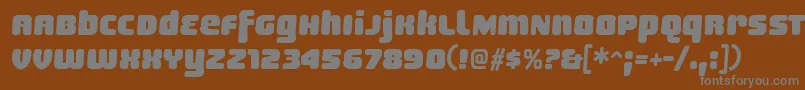SheaffRegular-fontti – harmaat kirjasimet ruskealla taustalla
