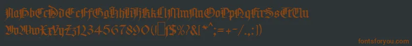 MaGotic Font – Brown Fonts on Black Background
