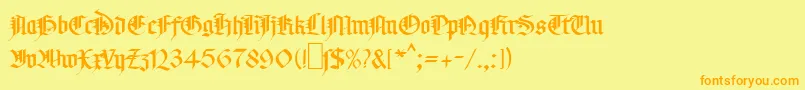 フォントMaGotic – オレンジの文字が黄色の背景にあります。