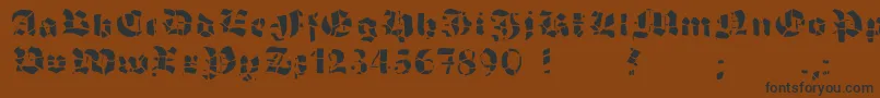 GrobehandF Font – Black Fonts on Brown Background