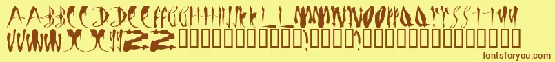 フォントLmsBloodyBrujah – 茶色の文字が黄色の背景にあります。