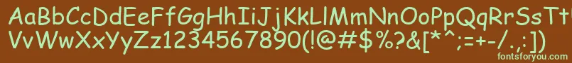 フォントComic0 – 緑色の文字が茶色の背景にあります。