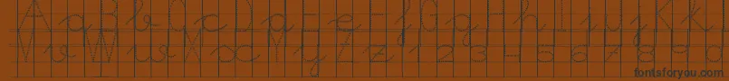 フォントMorasoft8 – 黒い文字が茶色の背景にあります