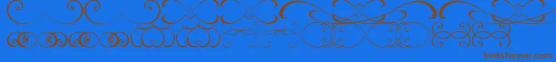 OrnamentsssTfb-Schriftart – Braune Schriften auf blauem Hintergrund