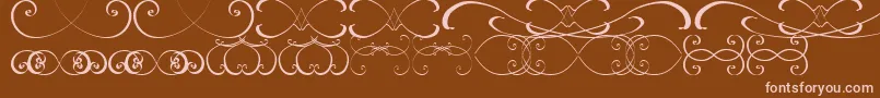 Шрифт OrnamentsssTfb – розовые шрифты на коричневом фоне