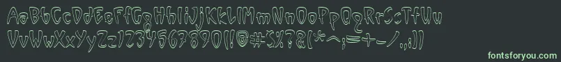 フォントVinylOutlineItcTt – 黒い背景に緑の文字