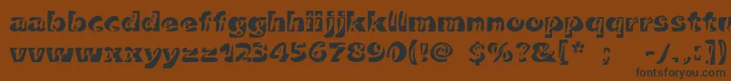 フォントDuettoc – 黒い文字が茶色の背景にあります