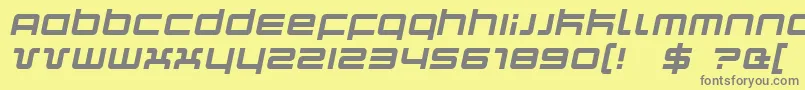 QuarkItalic-fontti – harmaat kirjasimet keltaisella taustalla