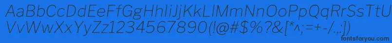 Czcionka LibrefranklinThinitalic – czarne czcionki na niebieskim tle