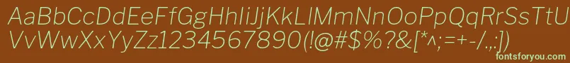フォントLibrefranklinThinitalic – 緑色の文字が茶色の背景にあります。