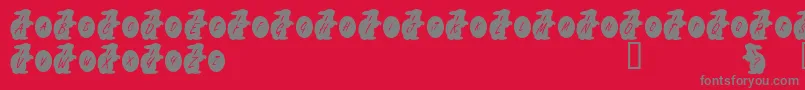 KrEasterRabbit-Schriftart – Graue Schriften auf rotem Hintergrund