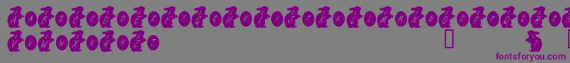 Czcionka KrEasterRabbit – fioletowe czcionki na szarym tle