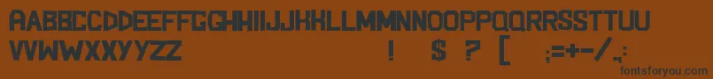 BlockemSockem-Schriftart – Schwarze Schriften auf braunem Hintergrund