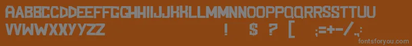 BlockemSockem Font – Gray Fonts on Brown Background