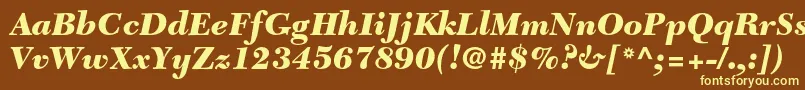 NewcaledonialtstdBlackit-fontti – keltaiset fontit ruskealla taustalla