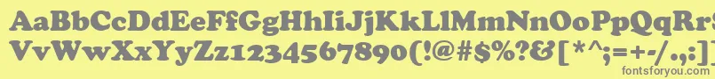 CooperBlack-fontti – harmaat kirjasimet keltaisella taustalla