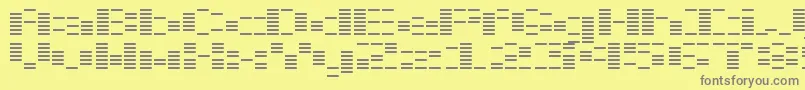 フォントOtoChou – 黄色の背景に灰色の文字