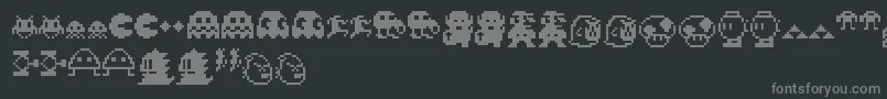フォントPixelcharas – 黒い背景に灰色の文字