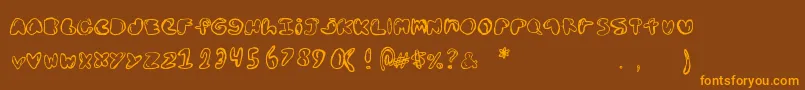 Bolddednick Font – Orange Fonts on Brown Background