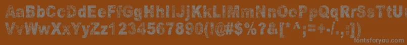 OranssiHohde-fontti – harmaat kirjasimet ruskealla taustalla