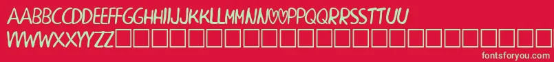 PeacechildBeta Font – Green Fonts on Red Background