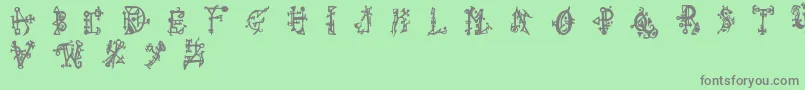 フォントWiquedt – 緑の背景に灰色の文字