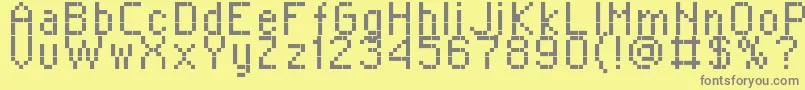 フォントRPlaza8 – 黄色の背景に灰色の文字
