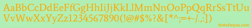 AverageRegular-Schriftart – Orangefarbene Schriften auf grünem Hintergrund