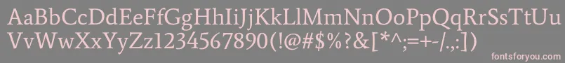 フォントAverageRegular – 灰色の背景にピンクのフォント