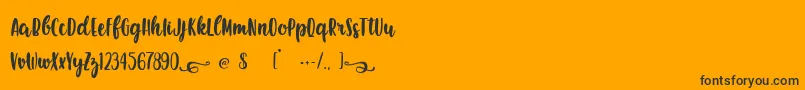 EarthQuest Font – Black Fonts on Orange Background