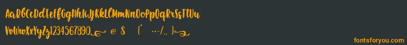 EarthQuest Font – Orange Fonts on Black Background