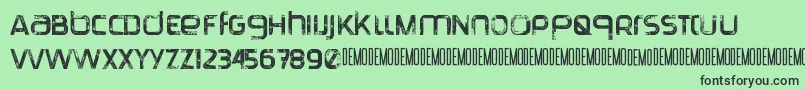 TranquilaDemo-fontti – mustat fontit vihreällä taustalla