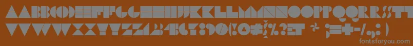 N17bl-fontti – harmaat kirjasimet ruskealla taustalla