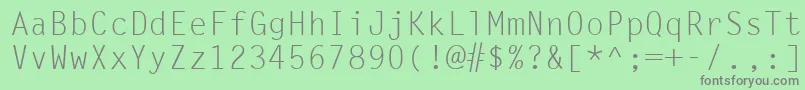 LetterGothicLt-Schriftart – Graue Schriften auf grünem Hintergrund