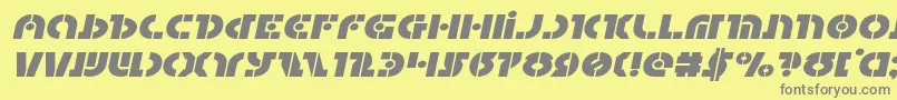 フォントQuestlokexpandital – 黄色の背景に灰色の文字