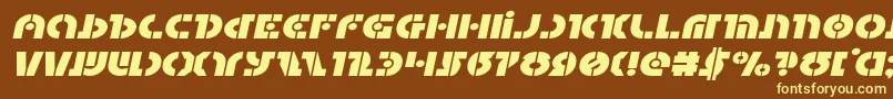 Questlokexpandital-fontti – keltaiset fontit ruskealla taustalla
