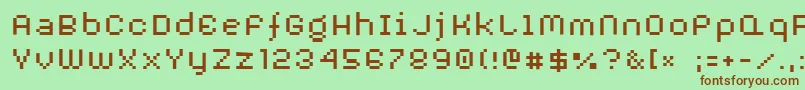 AuxDotbitcXtra-fontti – ruskeat fontit vihreällä taustalla