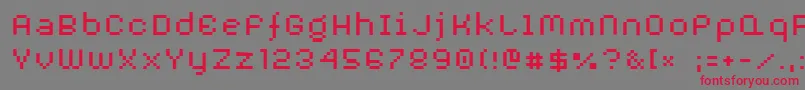 フォントAuxDotbitcXtra – 赤い文字の灰色の背景