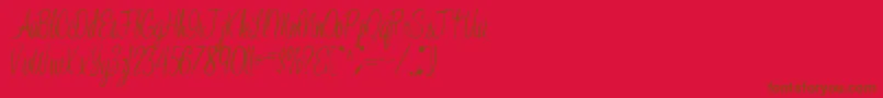 Jelindafont52Regular-Schriftart – Braune Schriften auf rotem Hintergrund